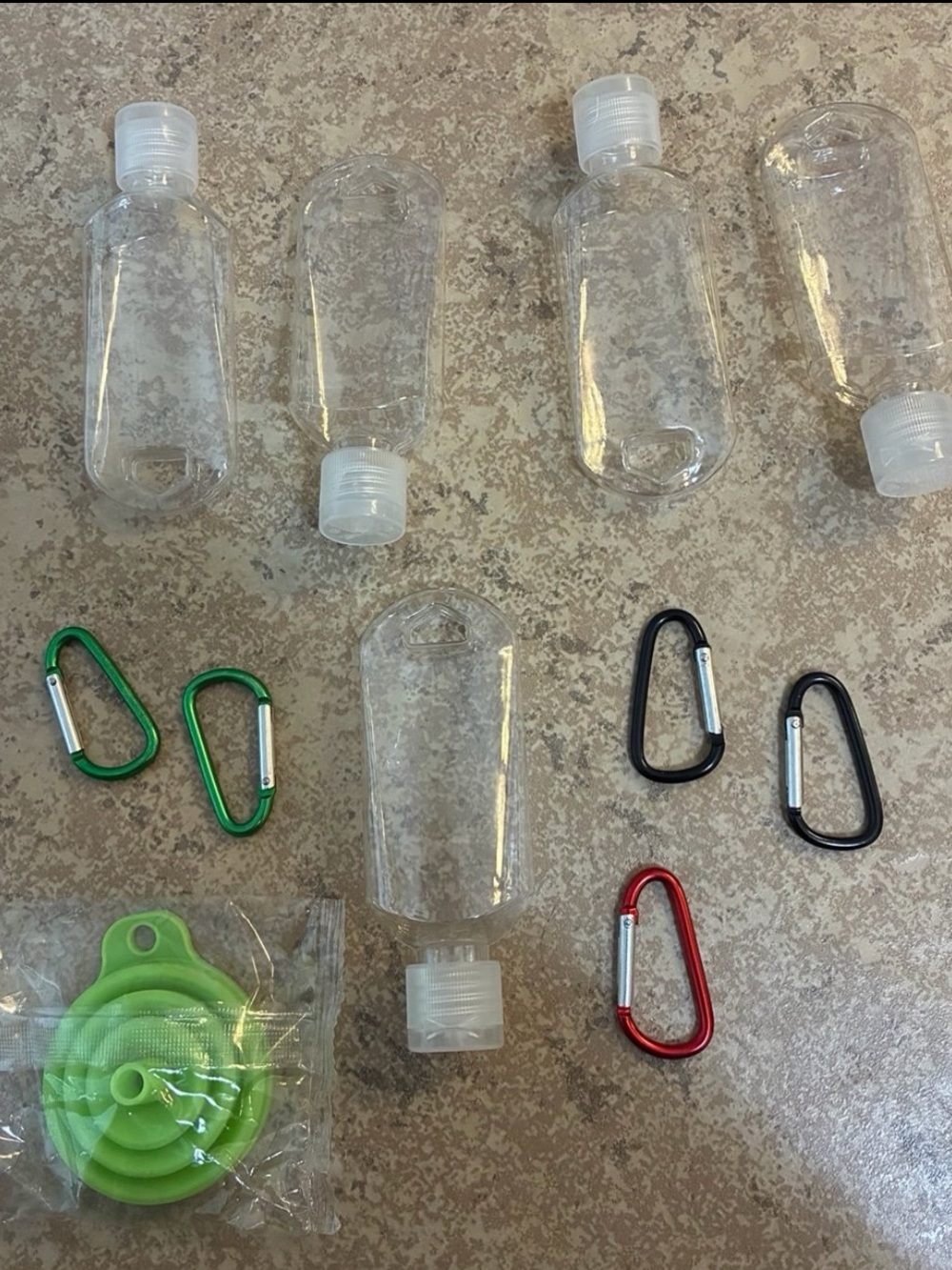 New! Travel Bottle kit designed for carrying liquids or gels on the go.